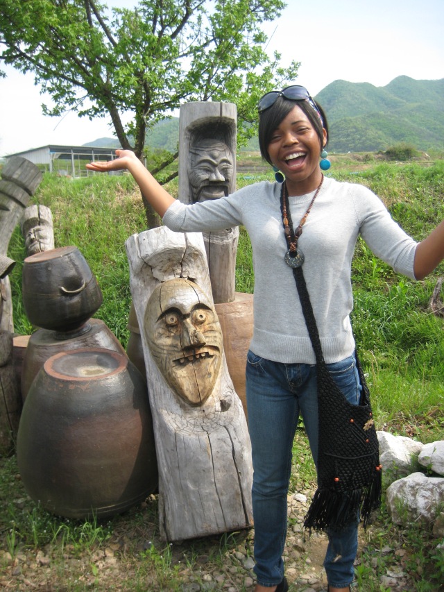 B with the totems at Hahoe Village
